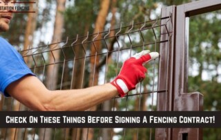 A person wearing a blue shirt and red glove inspects a metal fence outdoors, with text: Check On These Things Before Signing A Fencing Contract!.