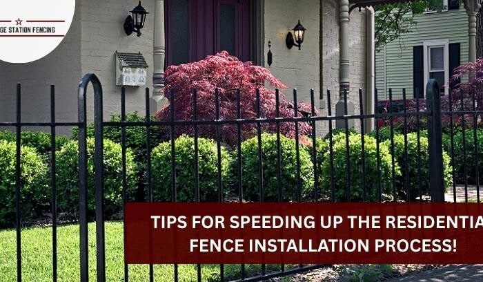 Black metal residential fence with decorative tips in Bryan, Texas.